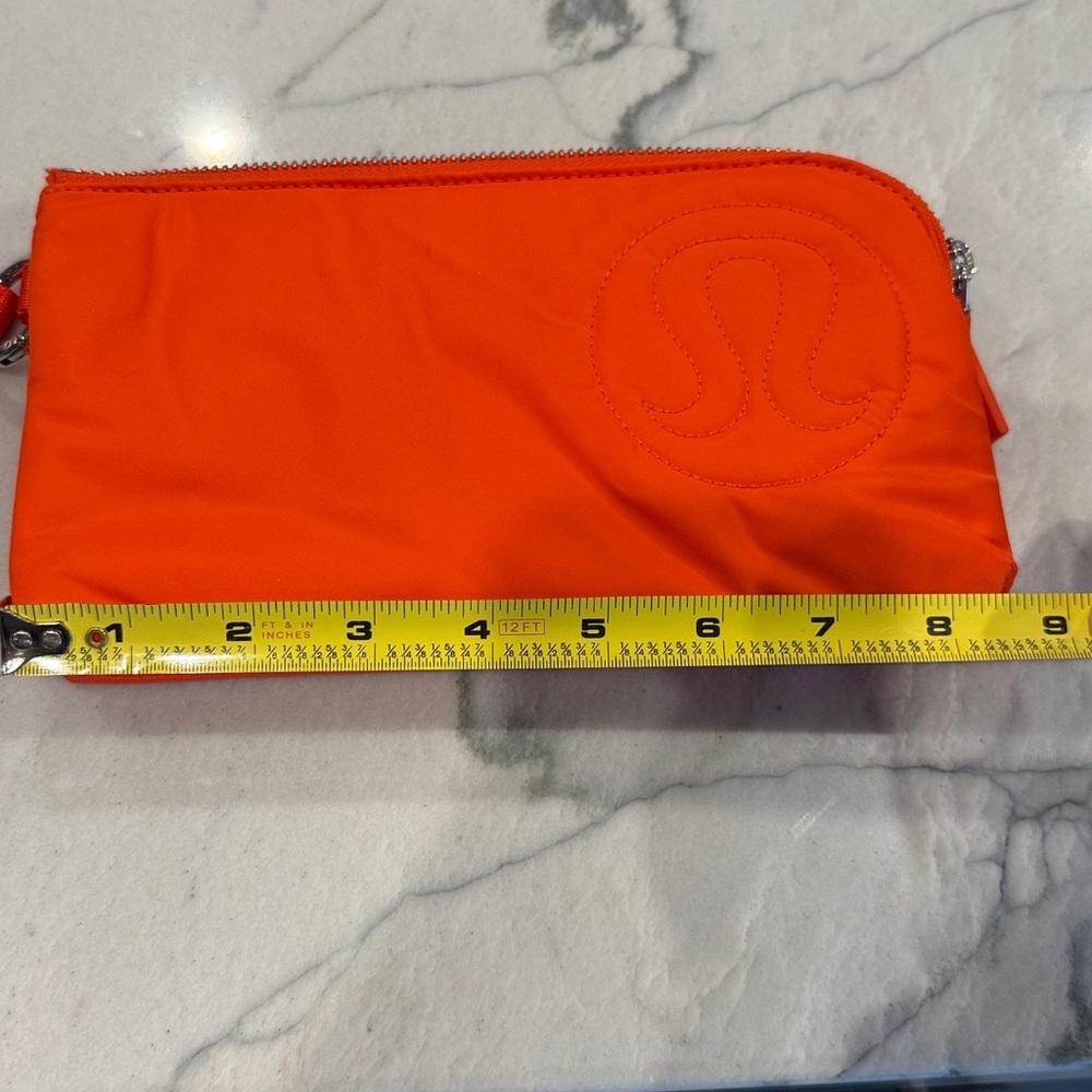 lululemon athletica Vibrant Orange puffy Wristlet - Picture 10 of 11